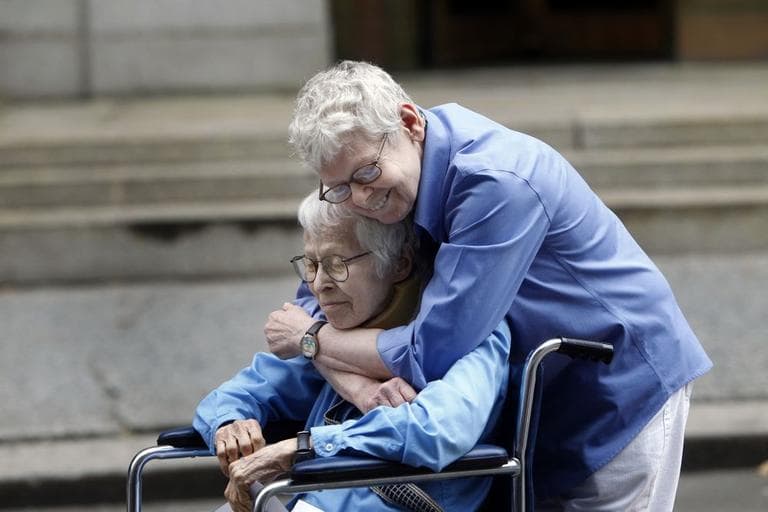 Phyllis Siegel, 76, left, and Connie Kopelov, 84, both of New York, embrace after becoming the first same-sex couple to get married at the Manhattan City Clerk's office on Sunday. (AP)