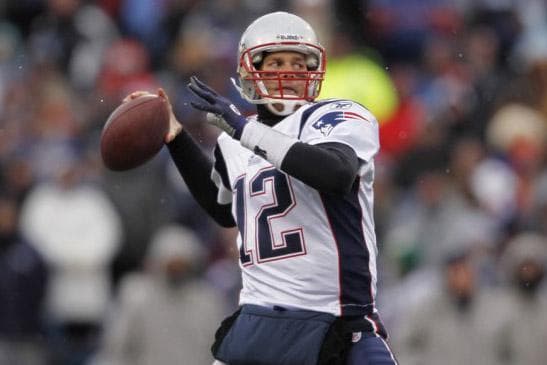 Tom Brady and his Patriots teammates are back on the job after the NFL lockout ended Monday. (AP)