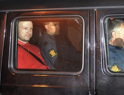 Norwegian mass murder suspect Anders Behring Breivik seen in a police vehicle. (AP)