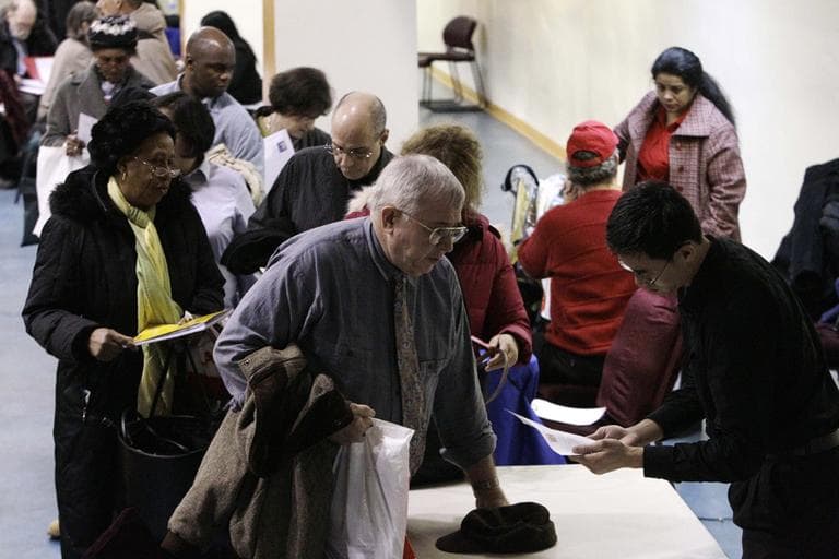 Older workers line up to submit resumes at an AARP event career event in New York in January. (AP)