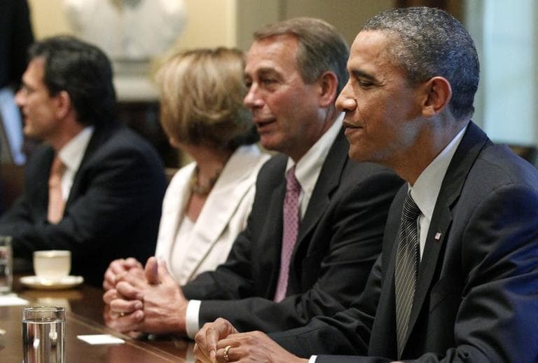 President Obama and House Speaker John Boehner meet with Republican and Democratic leaders regarding the debt ceiling in the Cabinet Room of the White House in Washington in July. (AP)