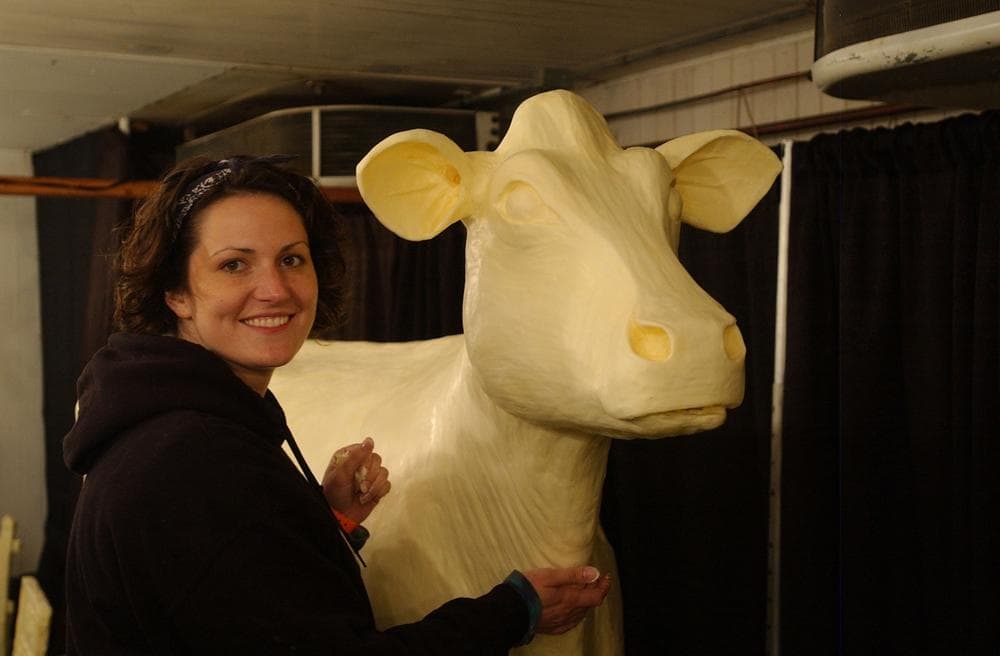 Sarah Pratt, current butter cow sculptor at the Iowa State Fair and her 2010 butter cow. (Courtesy Iowa State Fair)