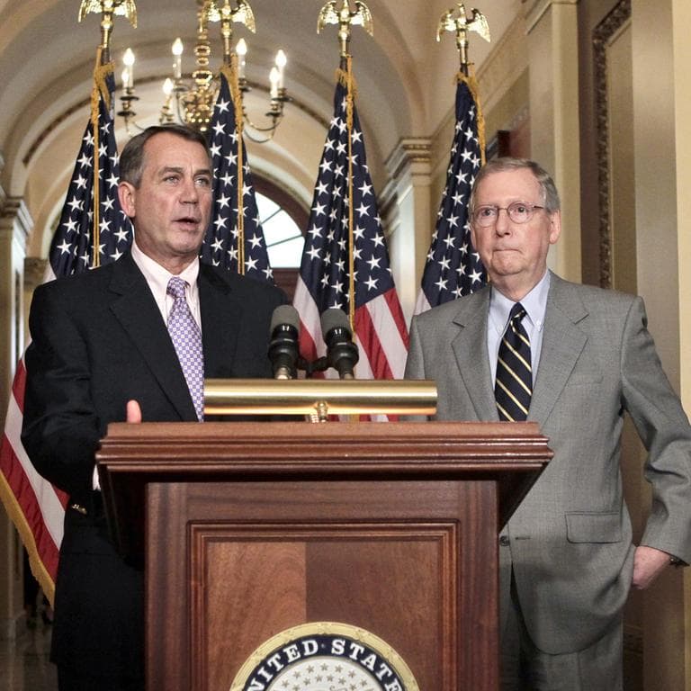 Speaker of the House John Boehner, R-Ohio, left, and Senate Republican leader Mitch McConnell of Kentucky, right, appear at a news conference about the debt crisis. (AP)