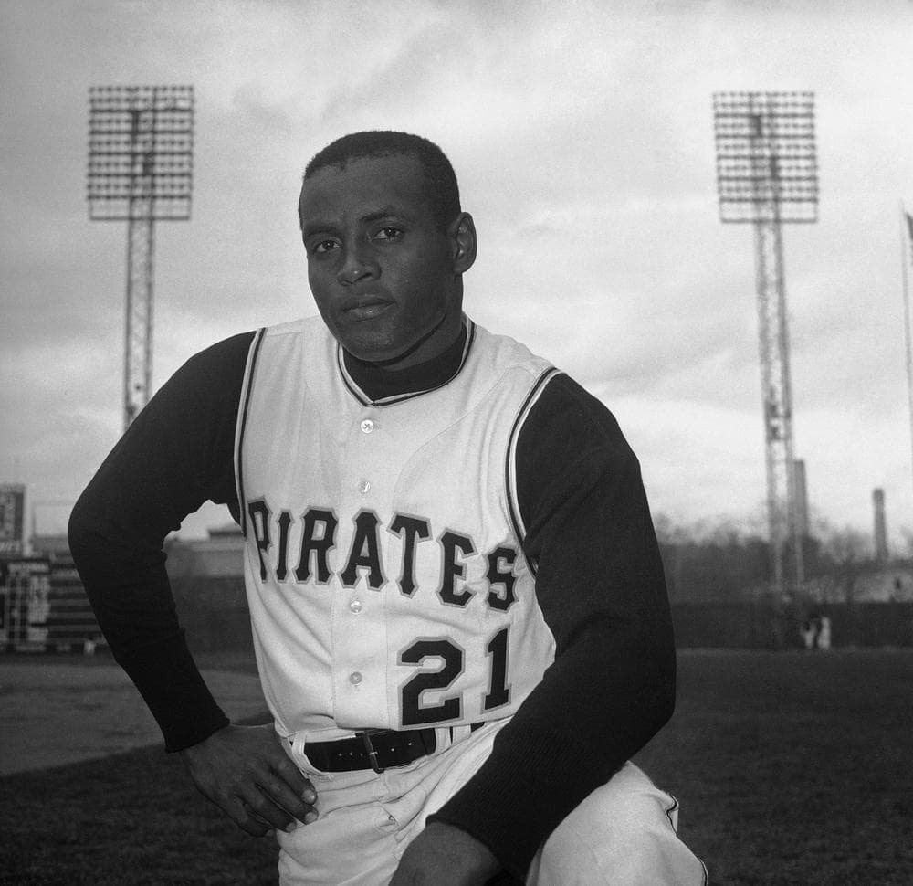 In the new, sports issue of 'The Nation,' Dallas Mavericks owner Mark Cuban and filmmaker John Sayles each write about idolizing Pittsburgh Pirates star Roberto Clemente, shown here in 1965. (AP)