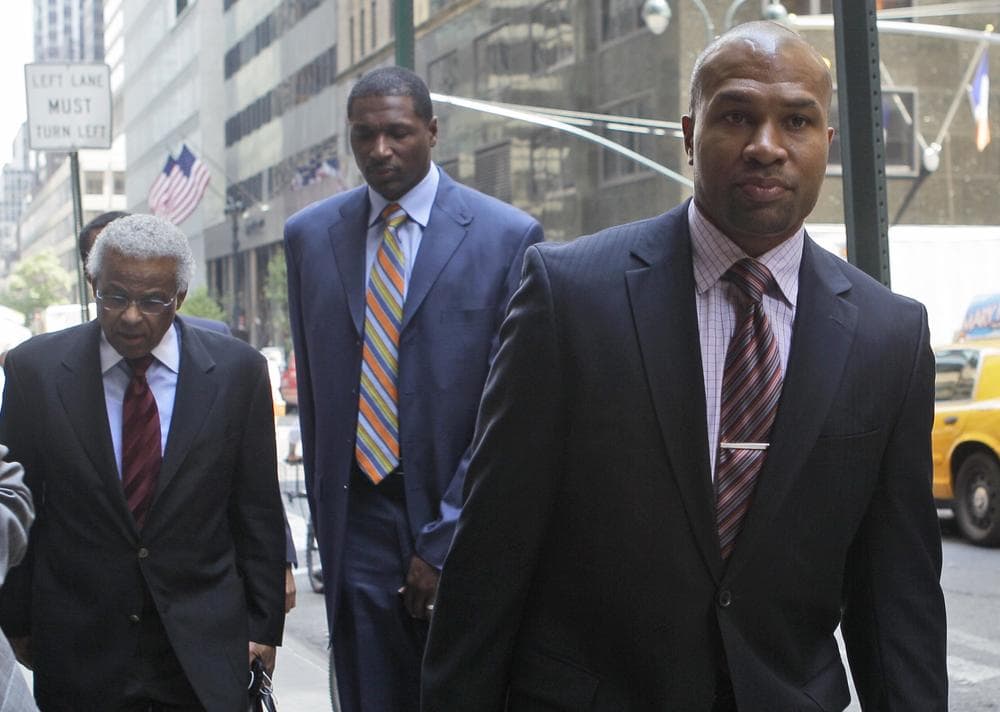 NBA Players Association president Derek Fisher arrives in New York for a meeting with the NBA, Monday. (AP)