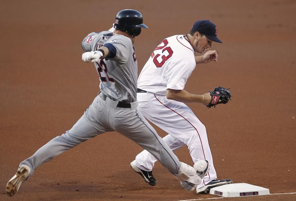 Boston Red Sox starting pitcher Erik Bedard beats Cleveland Indians&#039; Jason Kipnis to first base for the out during the first inning of the game in Boston on Thursday. (AP)