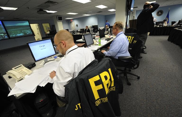 Agents from the FBI and other law enforcement agencies work at a 24-hour operations center at FBI headquarters in the Chelsea section of New York. (AP)