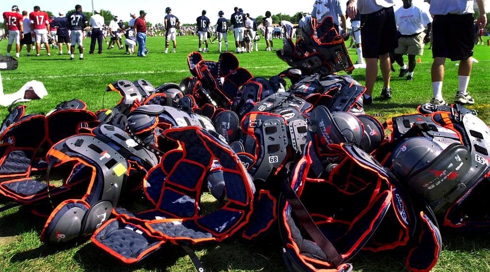 It's an NFL training camp tradition for rookies to carry veterans' shoulder pads off the field after practice. It's a ritual Bears receiver Roy Williams takes quite seriously. (AP)