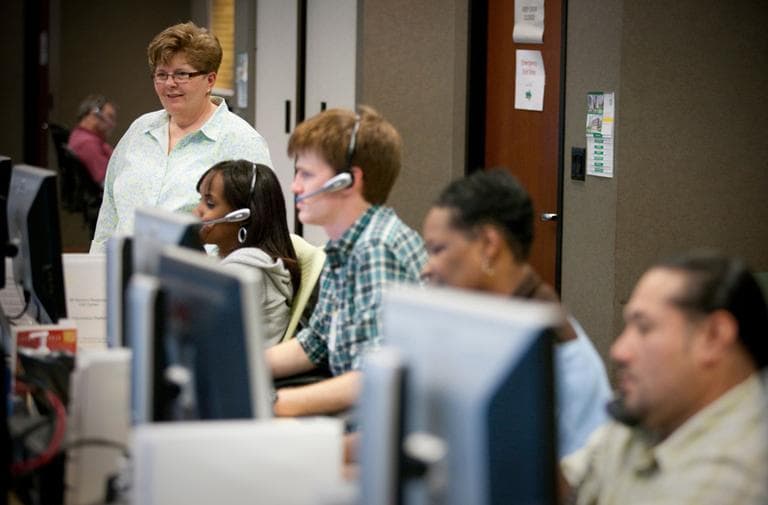 Operators speak with customers at BP America's Houston call center in July 2010. (BP America/Flickr)