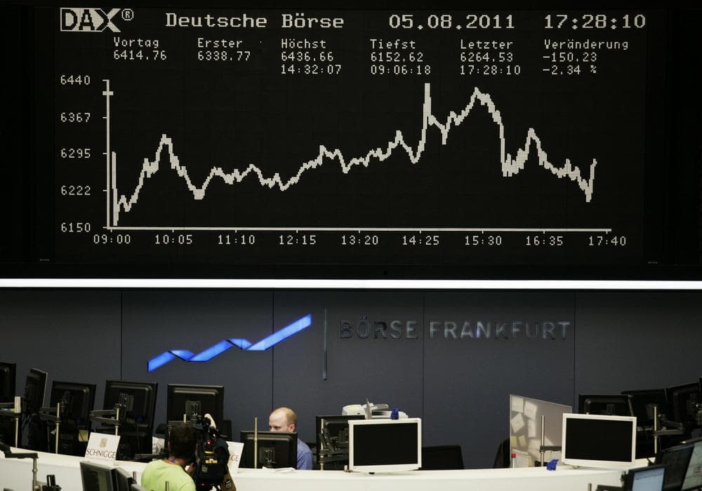 An electronic board shows the curve of the German index DAX at the stock exchange in Frankfurt, Germany. (AP)