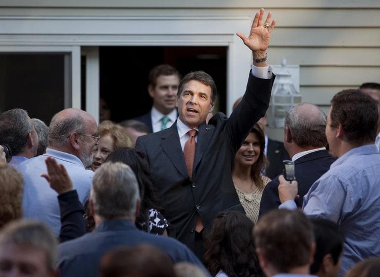 Republican presidential candidate Texas Gov. Rick Perry arrives for a house party in Greenland, N.H., Saturday. (AP)