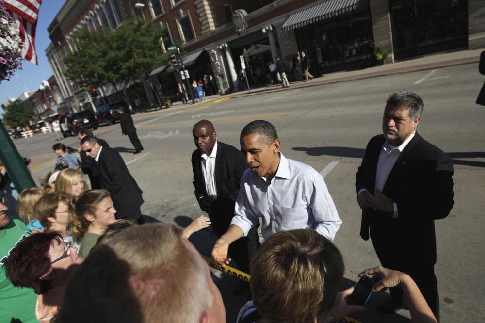 President Obama greets people in downtown Decorah, Iowa, on Tuesday during his three-day economic bus tour. (AP)