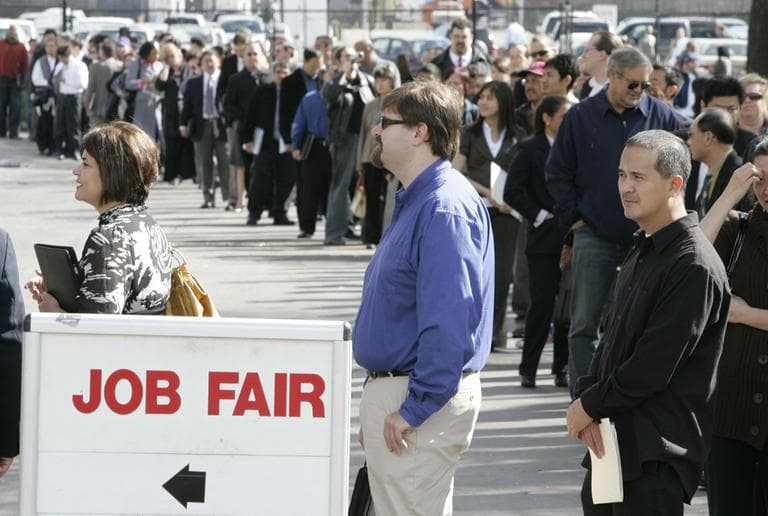 Hundreds of people wait in line to get into a job fair presented by Jobs and Careers Newspaper and Job Fairs in San Mateo, Calif.   (AP)