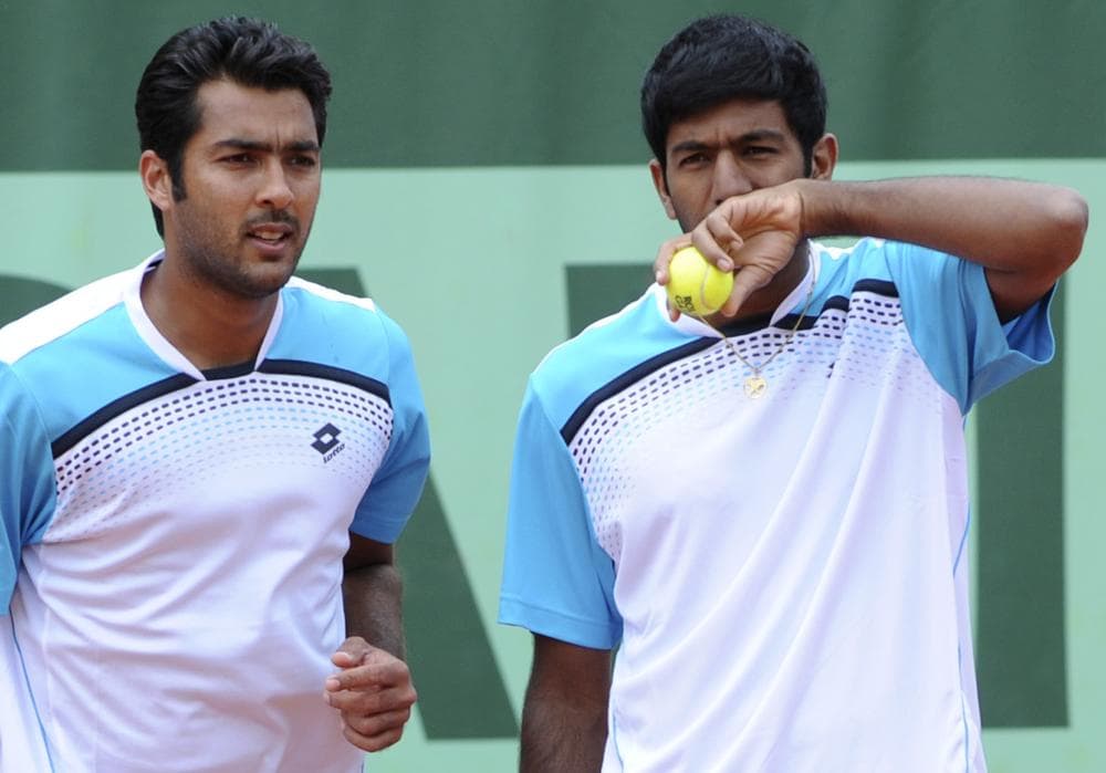 Pakistan's Aisam-ul-haq Qureshi, left, and India's Rohan Bopanna play at the French Open in May. (AP)