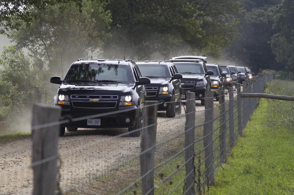 A motorcade with President Obama and his family moves from Blue Heron Farm in Chilmark to a beach in Edgartown, Sunday.  (AP)