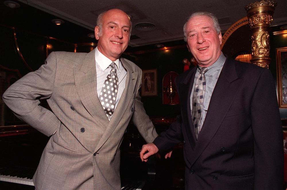 Songwriters Mike Stoller, left, and Jerry Leiber, right, pose in the Russian Tea Room in New York City, Thursday, July 23, 1992. (AP)