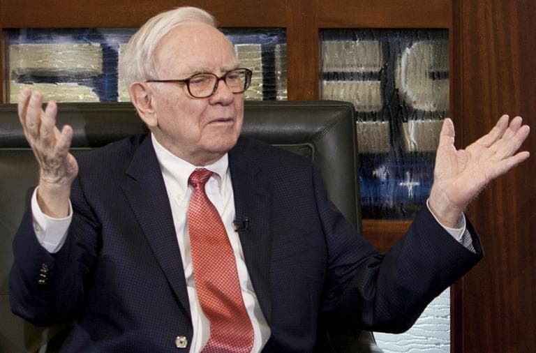 Billionaire investor Warren Buffett, Chairman and CEO of Berkshire Hathaway, gestures in Omaha, Neb. (AP)
