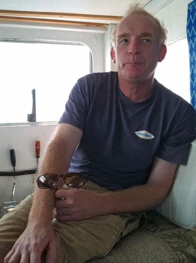 Gloucester fisherman Don Smith, on his boat (Lisa Tobin/WBUR)