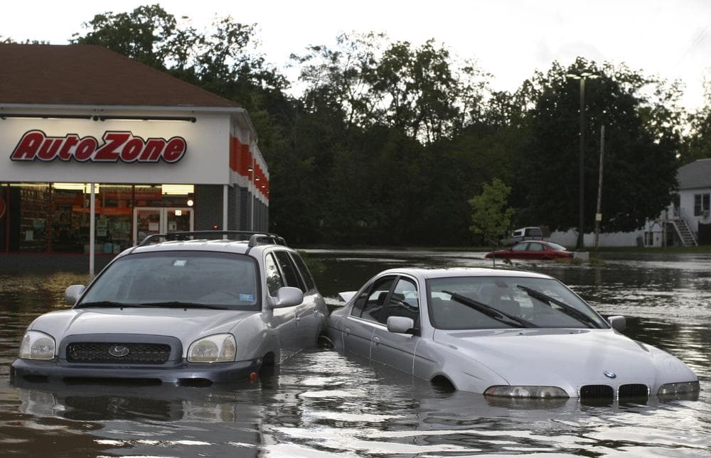 Flooded cars outside a store in Washingtonville, N.Y., Sunday following heavy rains from Hurricane Irene. (AP)