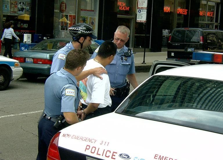 A court ruling affirmed the legality of capturing video of police officers. (grendelkhan/Flickr)