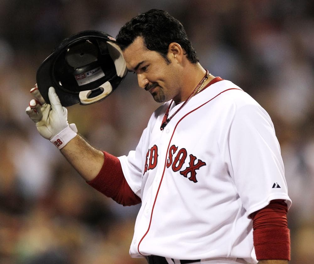 Boston Red Sox&#039;s Adrian Gonzalez heads back to the dugout after flying out against the New York Yankees at Fenway Park in Boston on Tuesday. Gonzalez went 0 for 5. (AP)