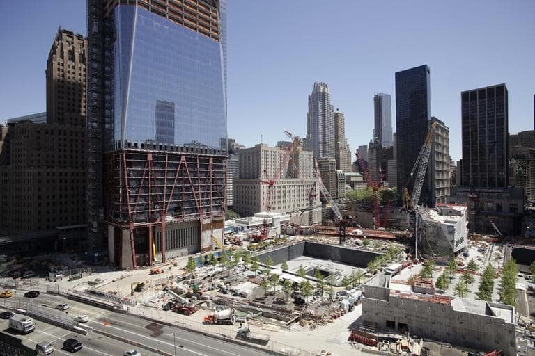 Construction continues on the National September 11 Memorial at the World Trade Center site, Tuesday, May 10, 2011 in New York. On the left is 1 World Trade Center, also known as the Freedom Tower. (AP)