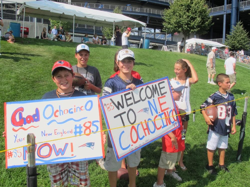 Young New England Patriots fans offered a warm welcome to newly acquired wide receiver Chad Ochocinco during training camp on Tuesday. (Bill Littlefield/Only A Game)