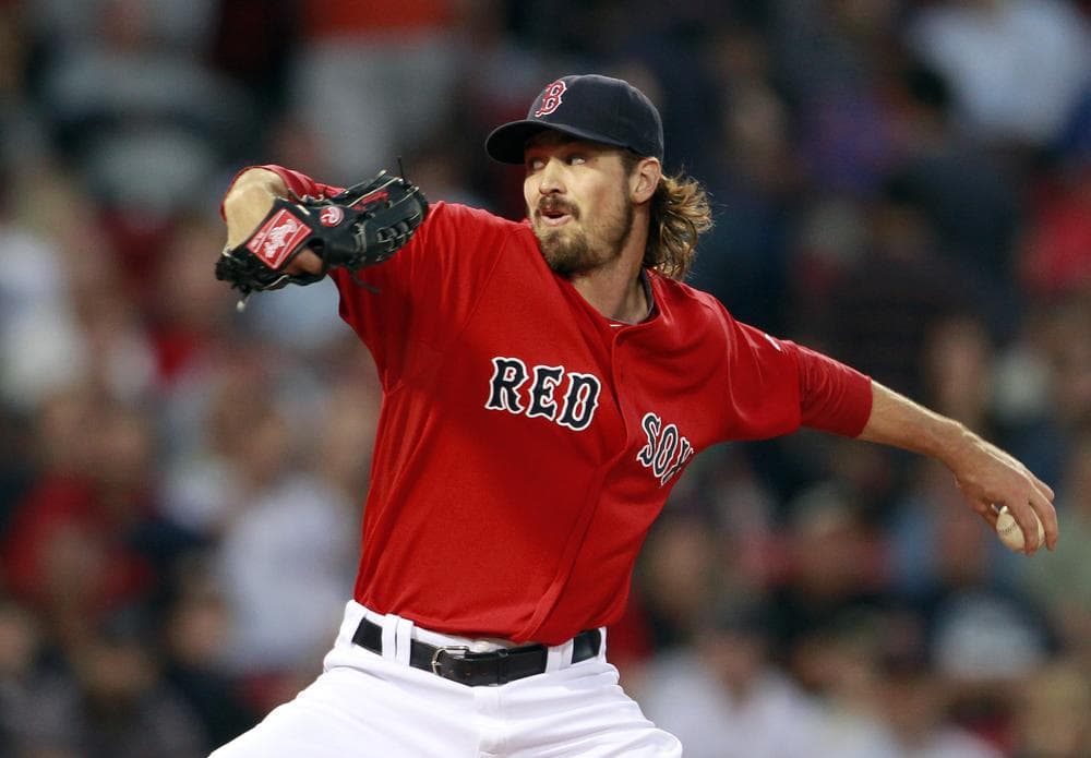  Red Sox&#039;s Andrew Miller pitches in the first inning Friday night. (AP)