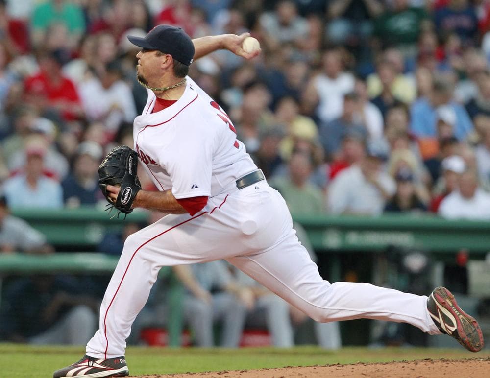 Boston Red Sox&#039;s Josh Beckett pitches in the second inning of a baseball game against the Seattle Mariners in Boston on July 23, 2011. (AP)