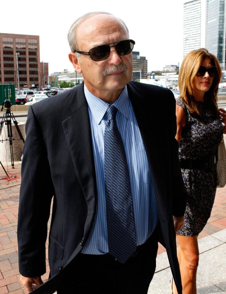 Former Speaker Salvatore DiMasi, accompanied by his wife Debbie, arrives for his sentencing hearing Friday in Boston federal court. (AP)