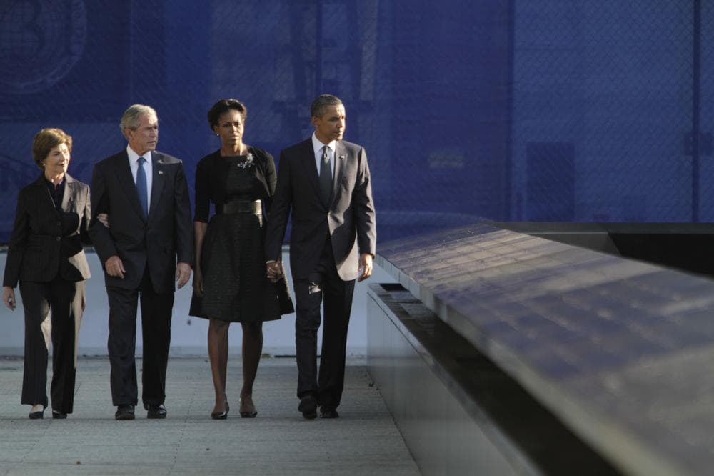President Obama, right, first lady Michelle Obama, former President George W. Bush and former first lady Laura Bush arrive at the National September 11 Memorial in New York Sunday. (AP)