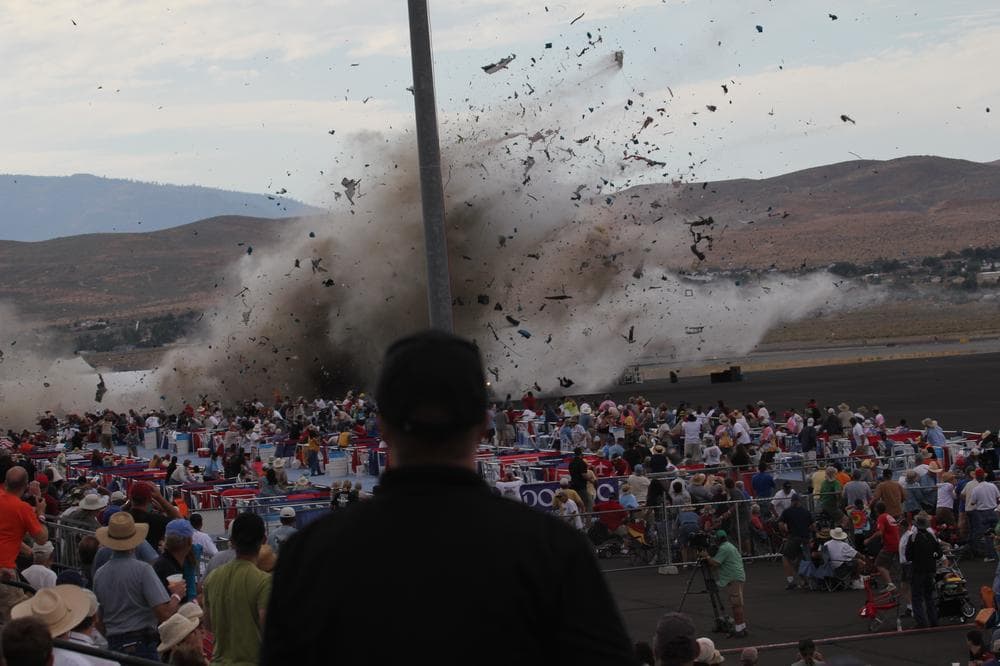 A P-51 Mustang airplane crashes into the edge of the grandstands at the Reno Air show on Friday. (AP)