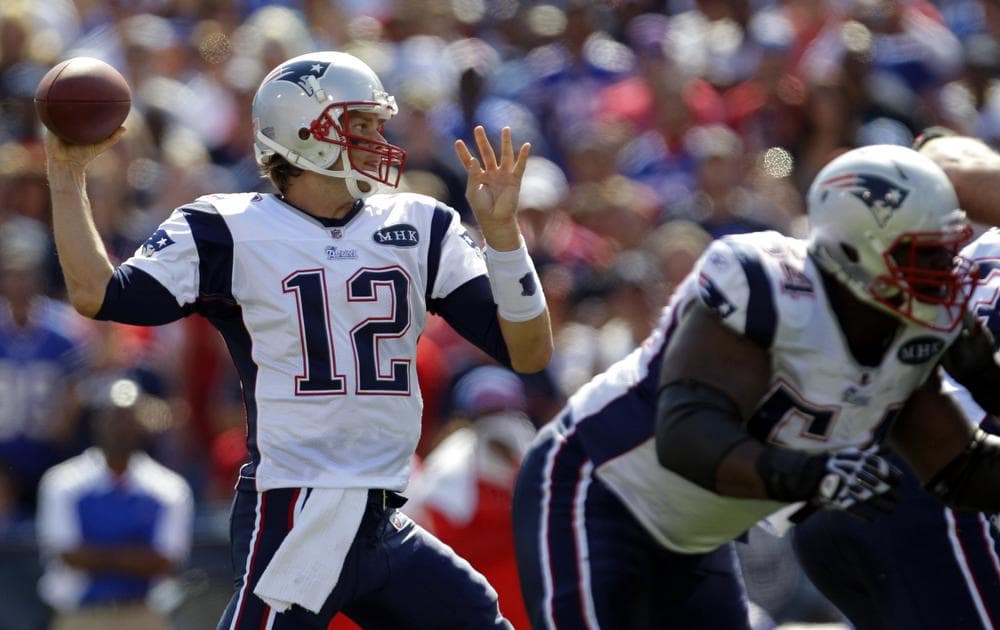 Tom Brady throws against the Buffalo Bills during the first quarter in Orchard Park, N.Y., on Sunday. (AP)