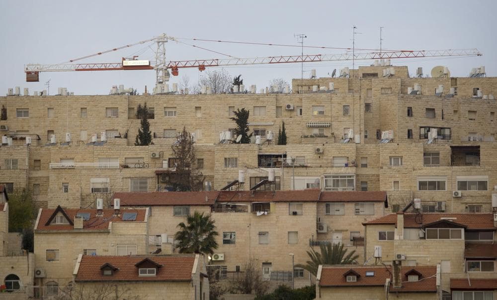 FILE - In this Jan. 16,  2011 file photo construction cranes are seen at the Jewish neighborhood of Gilo in Jerusalem.  Israel's government has given the final go-ahead for the construction of 1,100 new housing units in that area. (AP)