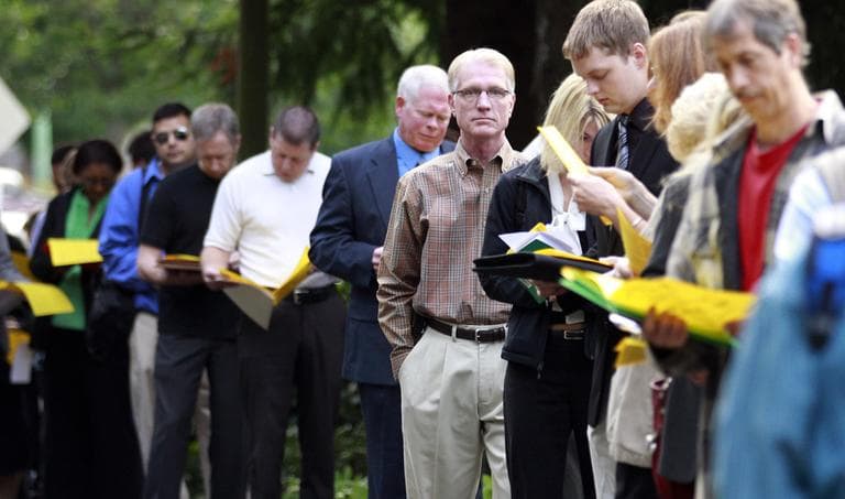 People wait in line at the 2011 Maximum Connections Job and Career Fair Thursday, Sept. 15, 2011, in Portland, Ore.  (AP)