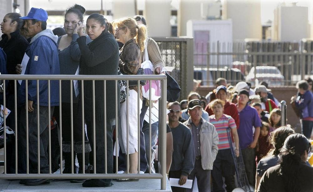 Hundreds lined up to pick up their Thanksgiving dinner food at the St. Mary's Food Bank Alliance in Nov., 2010, in Phoenix, AZ. (AP)