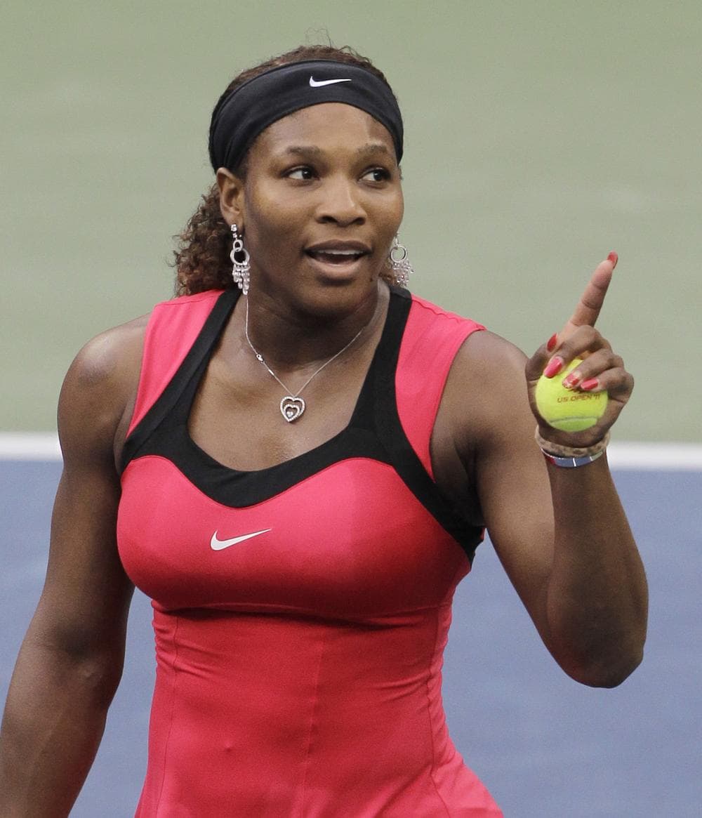 Serena Williams gestures while talking to the chair umpire Eva Asderakiduring the women's championship match at the U.S. Open tennis tournament in New York, Sunday. (AP)