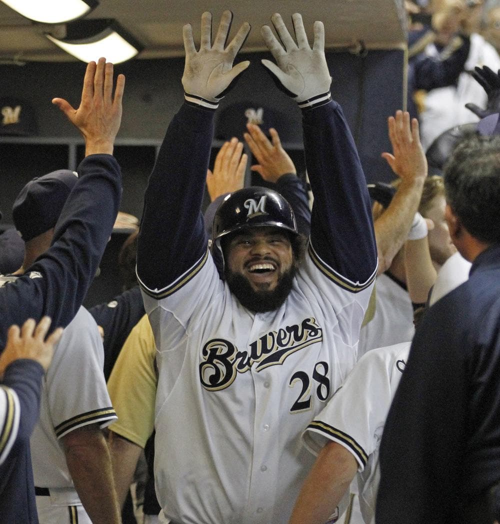 Milwaukee Brewers' Prince Fielder celebrates his third home run of the game during Tuesday's win against the Pirates. (AP)