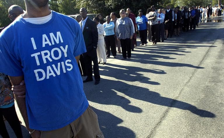 A line of people wait outside the Jonesville Baptist Church before the funeral of Troy Davis in Savannah, Ga. on Saturday. (AP)