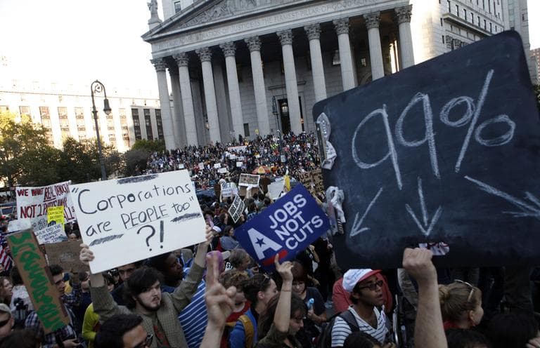 Occupy Wall Street protesters join a labor union rally in Foley Square before marching on Zuccotti Park in New York's Financial District, Wednesday, Oct. 5, 2011. (AP)