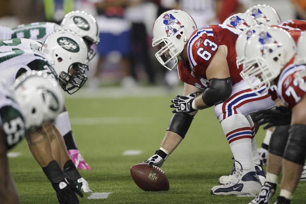 New England Patriots guard Dan Connolly (63) sets to snap the ball against the New York Jets on Sunday. (AP)