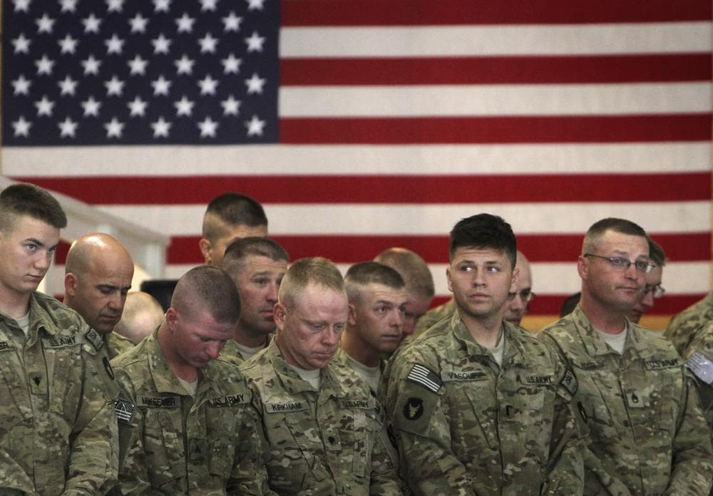 U.S. soldiers attend during a transfer of authority ceremony from Task Force Red Horse to Task Force Maverick at the U.S. base in Bagram, north of Kabul, Afghanistan in July. Task Force Red Horse is among two Cavalry regiments with the Iowa National Guard. (AP)
