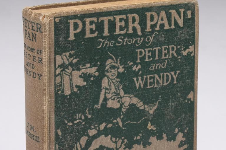 This photo released by Julien's Auctions shows a 1911 Grosset and Dunlap edition of &quot;Peter Pan: The Story of Peter and Wendy,&quot; by J.M.Barrie, with embossed cover and scenes from the photoplay featuring Betty Bronson. (AP)