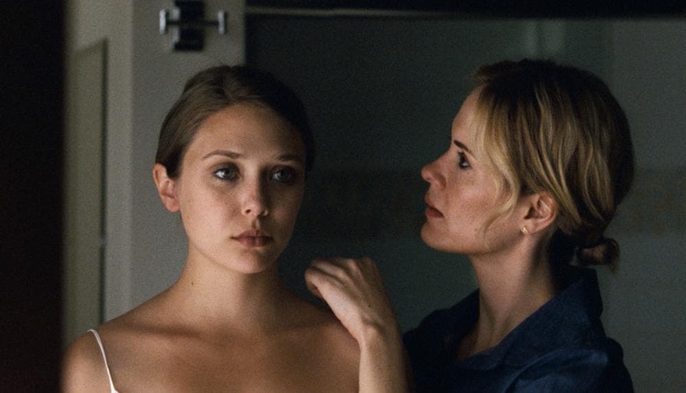 In this film image released by Fox Searchlight, Elizabeth Olsen, left, and Sarah Paulson are shown in a scene from &quot;Martha Marcy May Marlene.&quot;  (AP/Fox Searchlight)