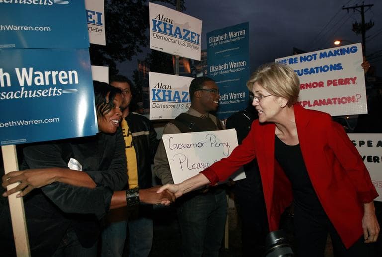 Elizabeth Warren, Democratic candidate for Senate, shakes hands with supporters in Lowell, Mass. (AP)