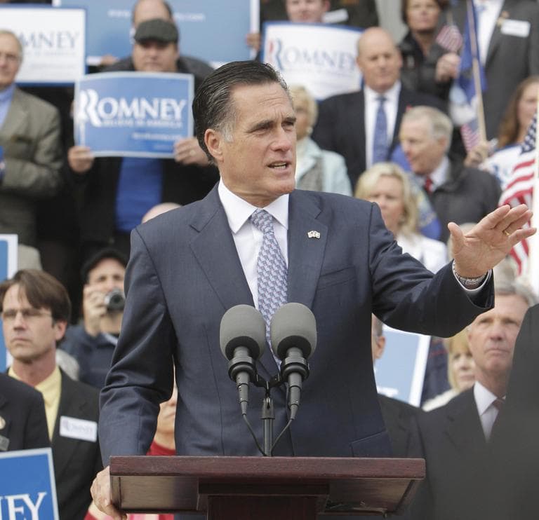 Former Massachusetts Gov. Mitt Romney talks to supporters in front of the State House in Concord, N.H., Monday. (AP)