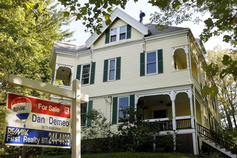 Despite a weak economy, Mass. housing sales climbed in September due to historically low interest rates. (AP)