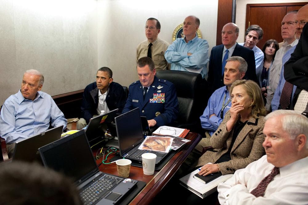 In this May 1, 2011 file image released by the White House shows Secretary of State Hillary Rodham Clinton, President Barack Obama and Vice President Joe Biden, along with with members of the national security team, receive an update on the mission against Osama bin Laden in the Situation Room of the White House in Washington.(Courtesy: The White House)