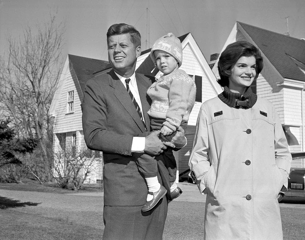 John F. Kennedy, then the Democratic presidential nominee, is shown with his wife Jacqueline and daughter Caroline outside their home in Hyannisport in 1960. (AP)