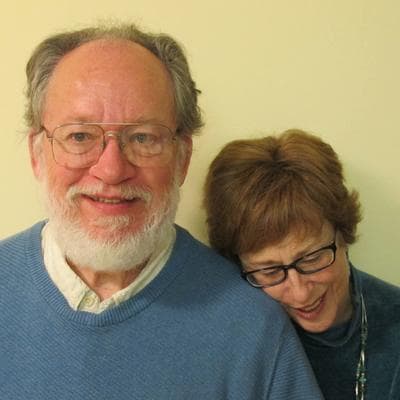 Ralph and Leslie Hergert in their home in Somerville. (Dan Mauzy/WBUR)